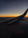 View on a wing thorugh the plane window Royalty Free Stock Photo