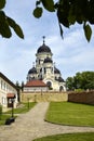 View of winter church of Holy Dormition Capriansky Monastery in Moldova. Monastery was founded in 1420. Concept religion,