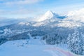 Winter landscape with snow covered Alps and ski track in Seefeld, Austria Royalty Free Stock Photo