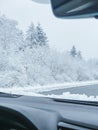 a view of the winter landscape from the window of the car Royalty Free Stock Photo