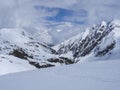 View on winter mountain landscape at Stubai Gletscher ski area with snow covered peaks at spring sunny day. Blue sky Royalty Free Stock Photo