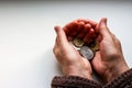 Woman`s hands holding russian coins. Royalty Free Stock Photo