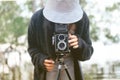 The view of women being photographed with a camera.