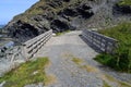 View of the wooden bridge over Rio Flumini near same Cala