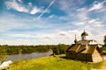 view of the wooden church and the river on Staraya Ladoga