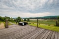 View from wooden deck over the little city Krasnobrod, Rozotcze, Poland. Lake, beach and hills covered with forest in the Royalty Free Stock Photo