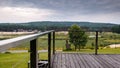 View from wooden deck over the little city Krasnobrod, Rozotcze, Poland. Lake, beach and hills covered with forest in the Royalty Free Stock Photo