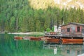 view of wooden dock boats station at braies lake in Italy Royalty Free Stock Photo