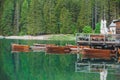 view of wooden dock boats station at braies lake in Italy Royalty Free Stock Photo