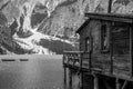 View of wooden dock pier in dolomites lake of Braies Royalty Free Stock Photo