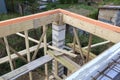 view of wooden formwork with holders, which will be filled with overlap between floors in country house under construction from Royalty Free Stock Photo
