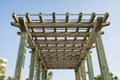 View of a wooden grid pergola roof from below against the sky at Destin, Florida Royalty Free Stock Photo