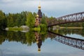 View of the wooden Temple of the Apostle Andrew the First-Called from the banks of the Vuoksa river, Russia, Leningrad region, Aug