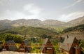 View of wooden weekend bungalow houses in the nature under large sky