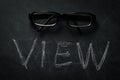 view - word view written in chalk on a blackboard with a pair of glasses on it