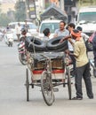 View of working rickshaw man in an Indian street