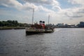 World famous Paddle Steamer Waverley heading down the River Clyde looking East from Govan, Glasgow, Scotland