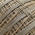 View of a woven texture, featuring interlaced strands of beige Royalty Free Stock Photo