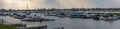 View of yacht harbour La Bonne Aventure along the river Meuse and the cooling towers of power plant of Maasbracht