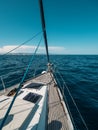 View from yacht prow heading in mediterranean sea with deep blue water in summer, Barcelona, Spain Royalty Free Stock Photo