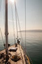 View from the yacht\'s deck to the bow and sails. Beautiful view from a bow of yacht at seaward