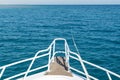 View from the yacht to the open sea. Ship in open sea is showing the bow in a summer day Royalty Free Stock Photo