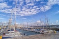 The view of yachts docking at marina near the Belem Monument of Discoveries in Lisbon, Portugal