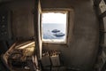 A view of yachts on the sea from a top window of a lighthouse