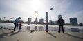 View of Yekaterinburg city and the White house from the embankment of the Iset river in a calm frosty weekend