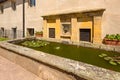 View of the yellow classicistic fountain made of sandstone