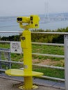 View on yellow Japanese touristic Binocular and Akashi Kaikyo Bridge