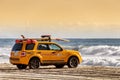 View of yellow lifeguard truck in Malibu beach, California.