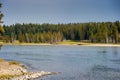 View of Yellowstone River with smoky sky from the Fishing Bridge in Yellowstone Royalty Free Stock Photo