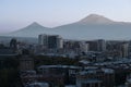 View of Yerevan at dusk against the background of the peak of Mount Ararat. Armenia.