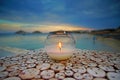 Nightview with a candle that you can admire after sunset from Kalafaty beach,Mykonos, Greece Royalty Free Stock Photo