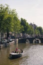 View of young people riding a small boat Royalty Free Stock Photo