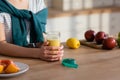 view of young woman in kitchen Royalty Free Stock Photo