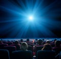 Viewers in cinema with blue star