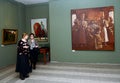 Viewers at the exhibition in Moscow state school of watercolour of Sergei Andriyaka in the painting `Tsar Ivan IV, surrounded by p