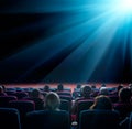 Viewers look at shining star in the cinema Royalty Free Stock Photo