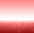 Viewers at movie theater, red toning copy space