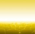 Viewers at movie theater, yellow toning copy space