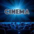Viewers sit in cinema, blue toning