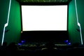Viewers watching movie at cinema with screen isolated in white, long exposure