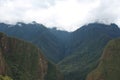 Viewing the clouds descending on the Andes mountains, Vilcambamba mountain range, from Machu Picchu Royalty Free Stock Photo