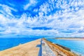 Viewing of clouds and sea from breakwater