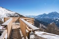Observation deck over snowcapped mountains against clear blue sky Royalty Free Stock Photo