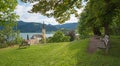 viewpoint with bench, Weinberg hill Schliersee with St. Sixtus church and bavarian alps