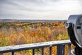 Viewpoint with Coin Binoculars with a Fabulous Landscape with Colorful Hills Covered with Autumn Maples in Vermont New England