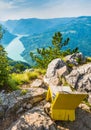 Viewpoint of green mountain valley and lake with cozy bench in Tara national park in Serbia